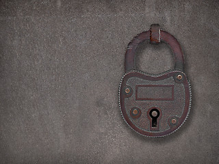 Image showing padlock on a rusty steel plate