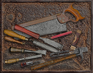 Image showing vintage woodworking tools over rusty plate