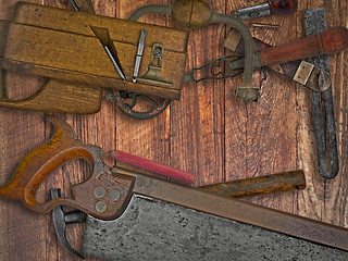 Image showing vintage woodworking tools on wooden bench