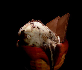 Image showing Melting Ice Cream with Chocolate Sprinkles