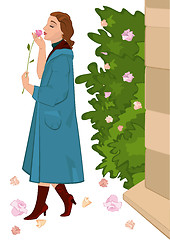 Image showing Retro girl with flower near rose bush