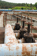 Image showing Rusty taps and pipes. water treatment plant 