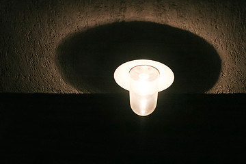 Image showing Light bulb on wall