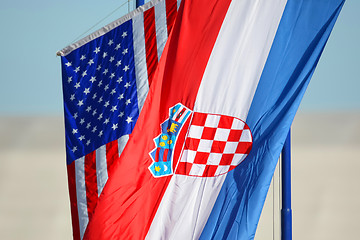 Image showing American and Croatian national flags waving
