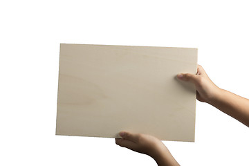 Image showing Plywood sign held up by young hands