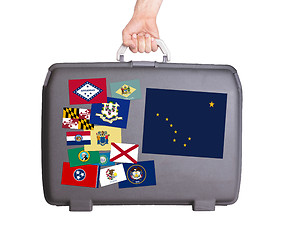 Image showing Used plastic suitcase with stains and scratches