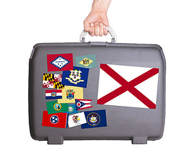 Image showing Used plastic suitcase with stains and scratches