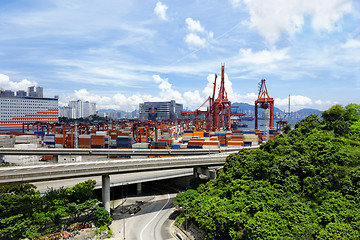 Image showing Port warehouse with containers and industrial cargoes