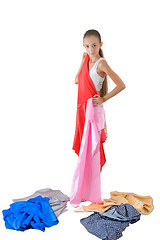 Image showing The girl tries on fabric