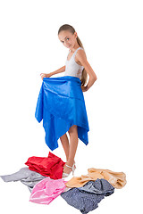 Image showing The girl tries on fabric
