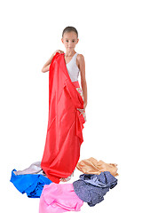 Image showing The girl tries on fabric