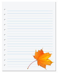 Image showing Notebook paper with autumn maple leaf on white