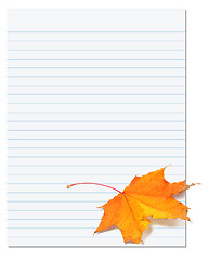 Image showing Notebook paper with autumn maple leaf on white