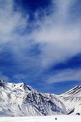 Image showing Winter mountains and blue sky with clouds