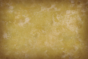 Image showing Grungy yellow mottled background texture