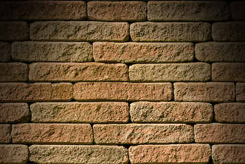 Image showing Rough red brick background lit from above