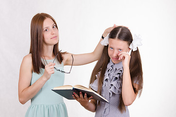 Image showing Teacher calms the student did not do their homework