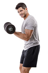 Image showing Athletic man lifting weights