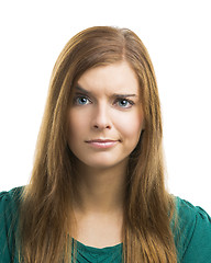 Image showing Young woman with a suspicious face