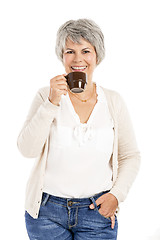 Image showing Elderly woman drinking coffee