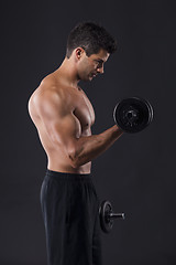 Image showing Muscular man lifting weights