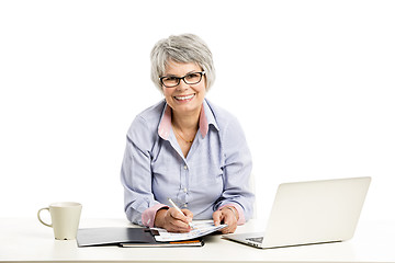 Image showing Ellderly woman working with a laptop