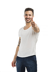 Image showing Man smiling with thumb up