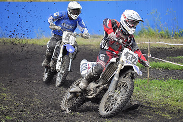 Image showing Racers on motorcycles participate in cross-country race competit