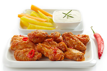 Image showing fried chicken wings and vegetables