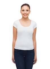 Image showing smiling young woman in blank white t-shirt