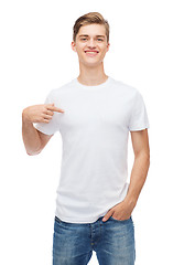 Image showing smiling young man in blank white t-shirt