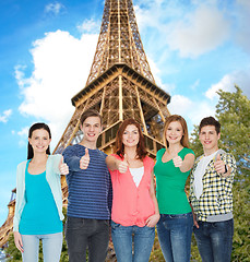 Image showing group of smiling students showing thumbs up