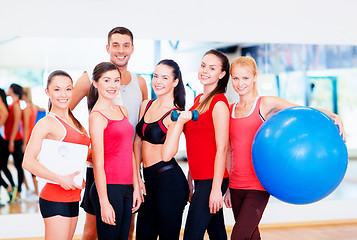 Image showing group of smiling people in the gym