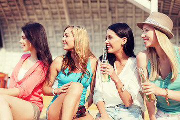 Image showing girls with drinks on the beach