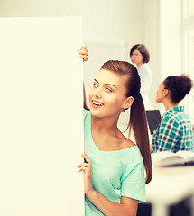 Image showing woman with white blank board at school