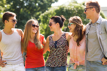 Image showing group of smiling friends outdoors