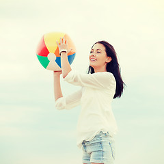 Image showing girl with ball on the beach
