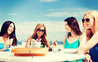 Image showing girls in cafe on the beach