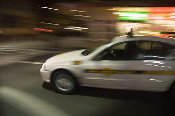 Image showing speeding taxi