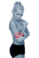 Image showing sporty woman with pain in elbow