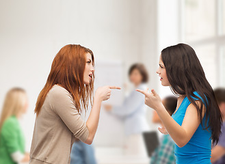 Image showing two teenagers having a fight at school