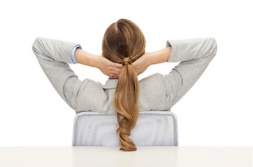 Image showing businesswoman sitting on chair from back