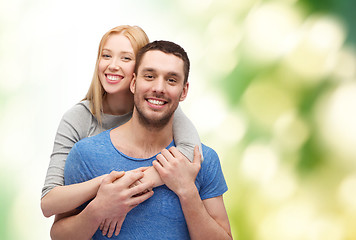 Image showing smiling couple hugging