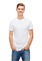 Image showing smiling young man in blank white t-shirt