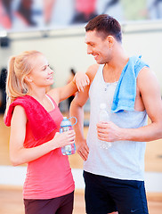 Image showing two smiling people in the gym