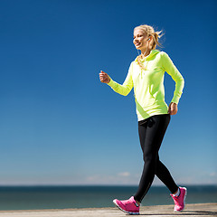 Image showing woman walking outdoors