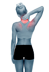 Image showing sporty woman touching her neck