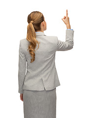 Image showing businesswoman or teacher in suit from back