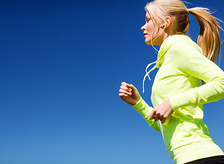 Image showing woman doing running outdoors