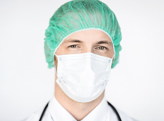 Image showing surgeon in medical cap and mask